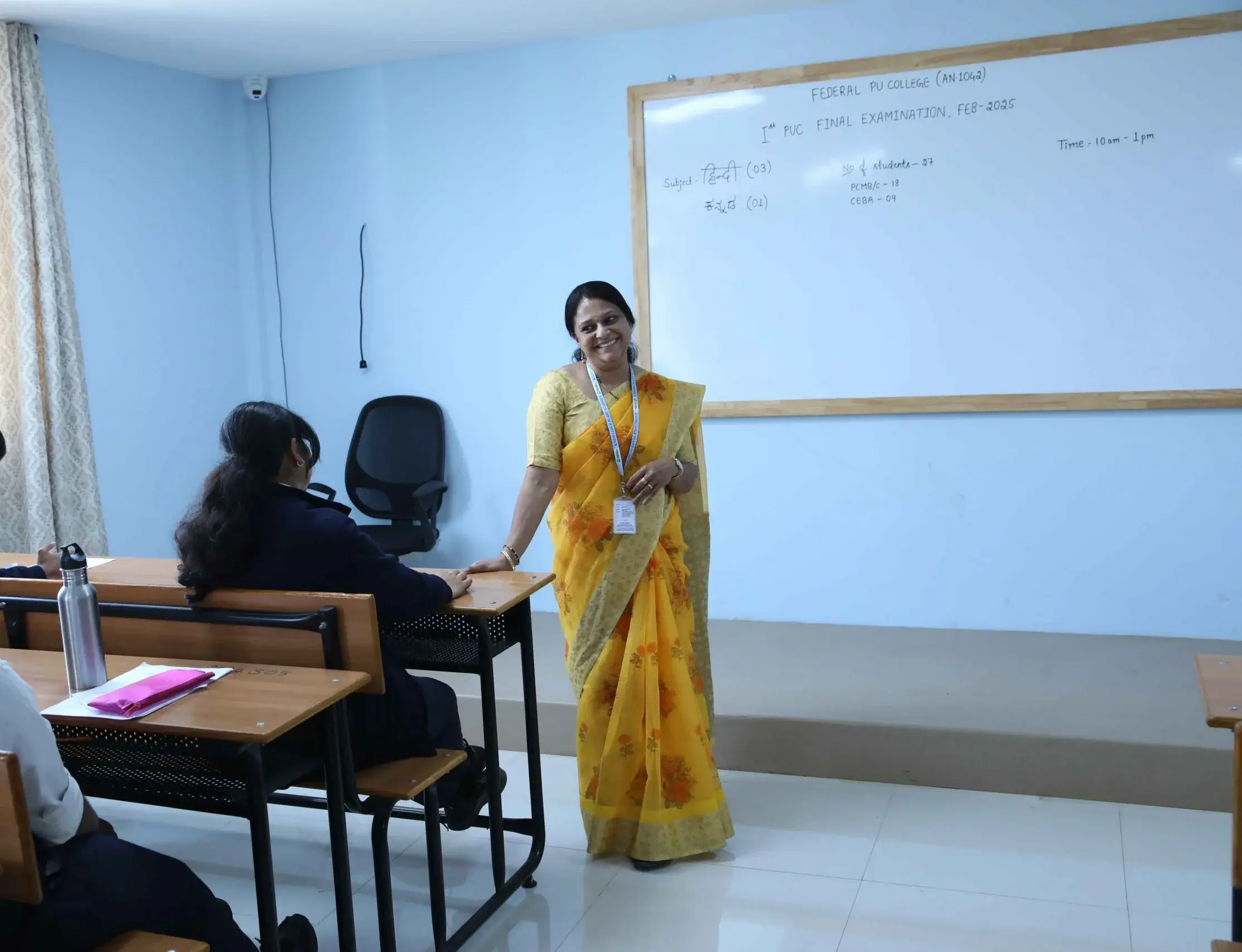 Teacher lecturing students at the best Integrated PU College in Bangalore